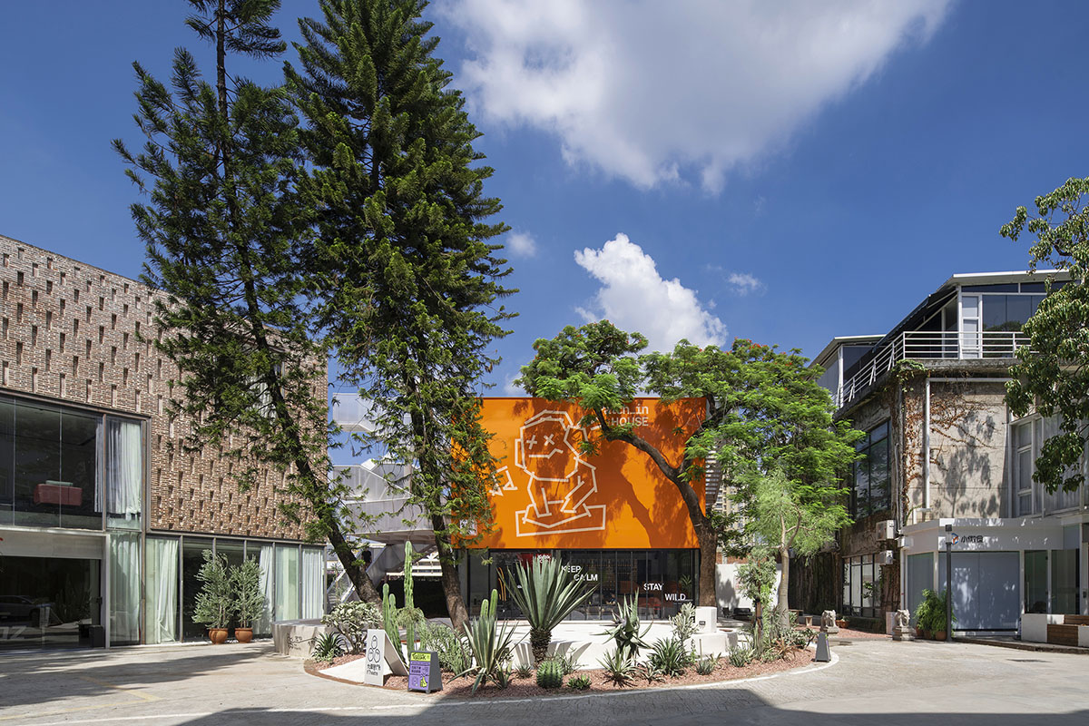 Wutopia Lab completes orange-colored vertical micro social complex with light tower in Guangzhou