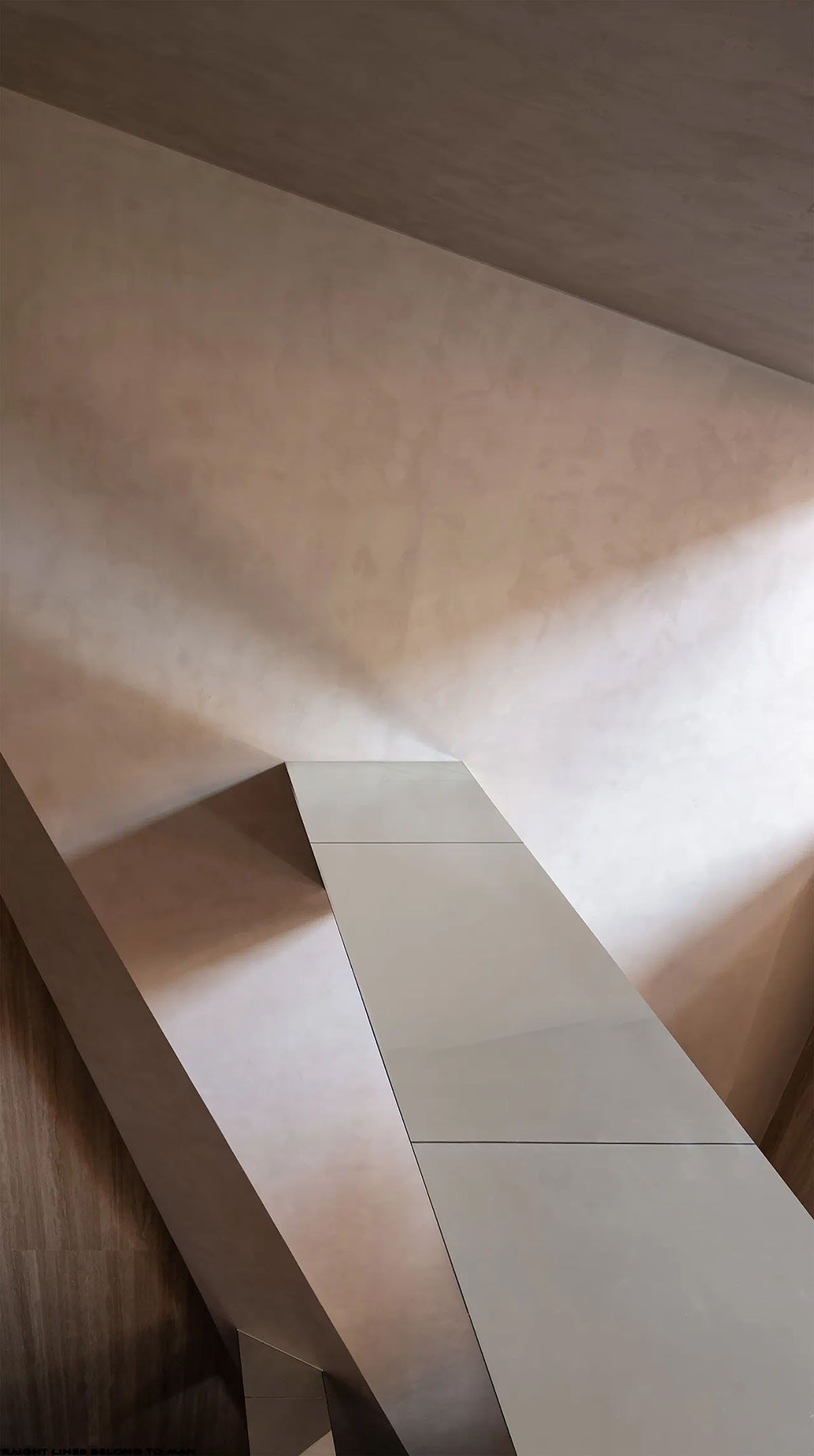 Exhibition hall interiors feature sharp angles and surfaces addressing diamond cutting processes