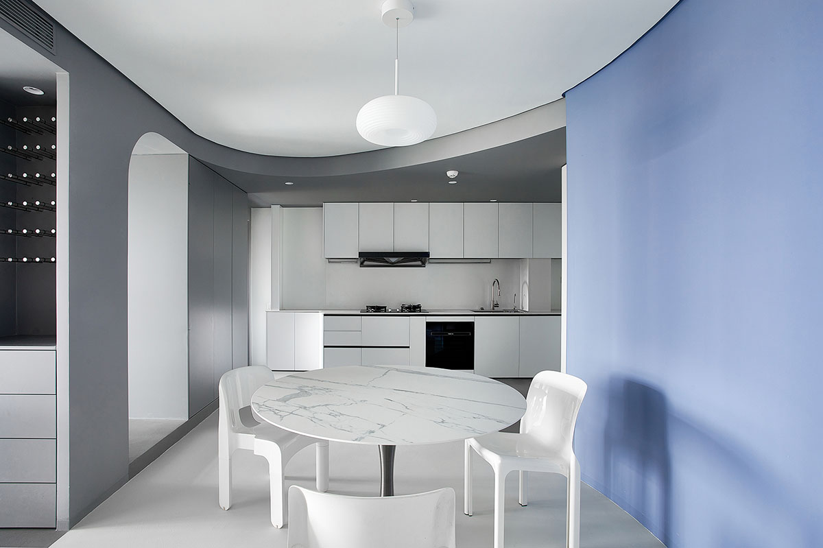 XIGO STUDIO creates gray and blue-colored interiors for apartment in Beijing 