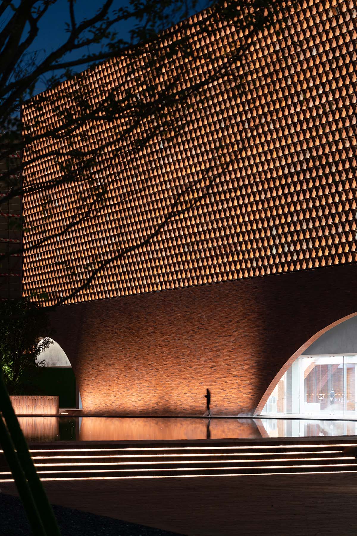 DOMANI completes TIC Art Center with red ceramic brick in Foshan 