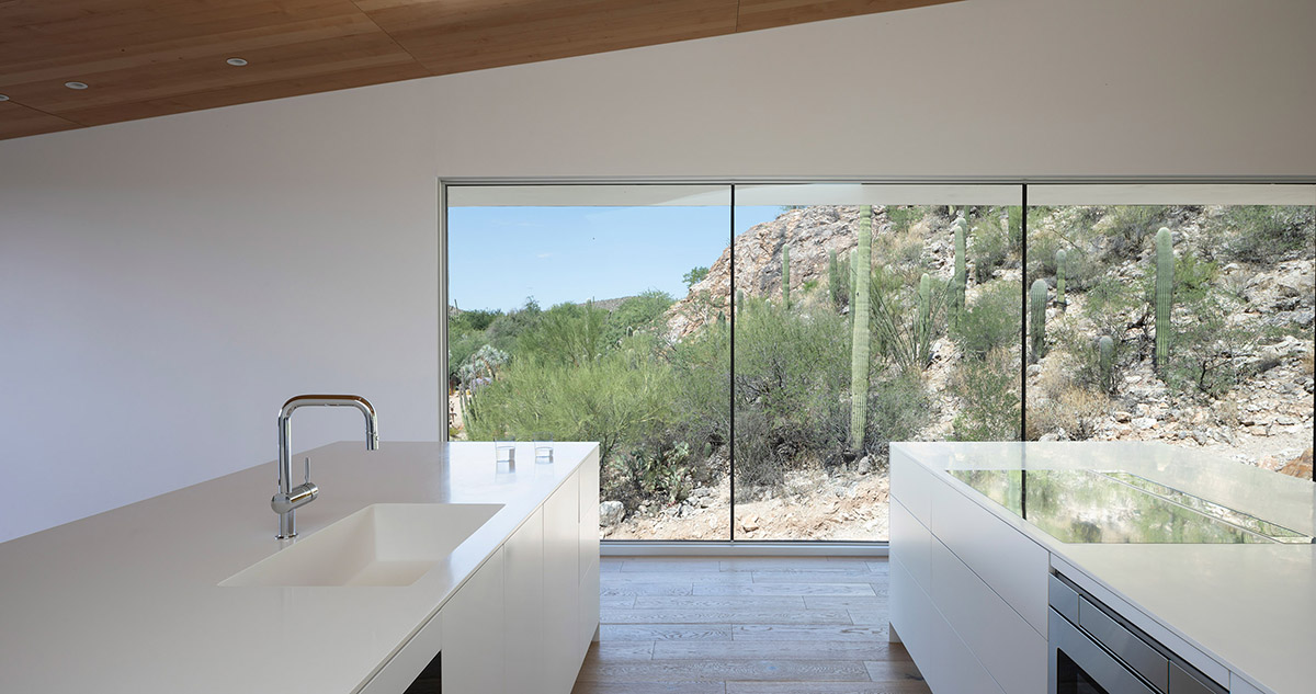 HK Associates Inc frames desert oasis with Ventana House featuring geometric protrudings in Tucson