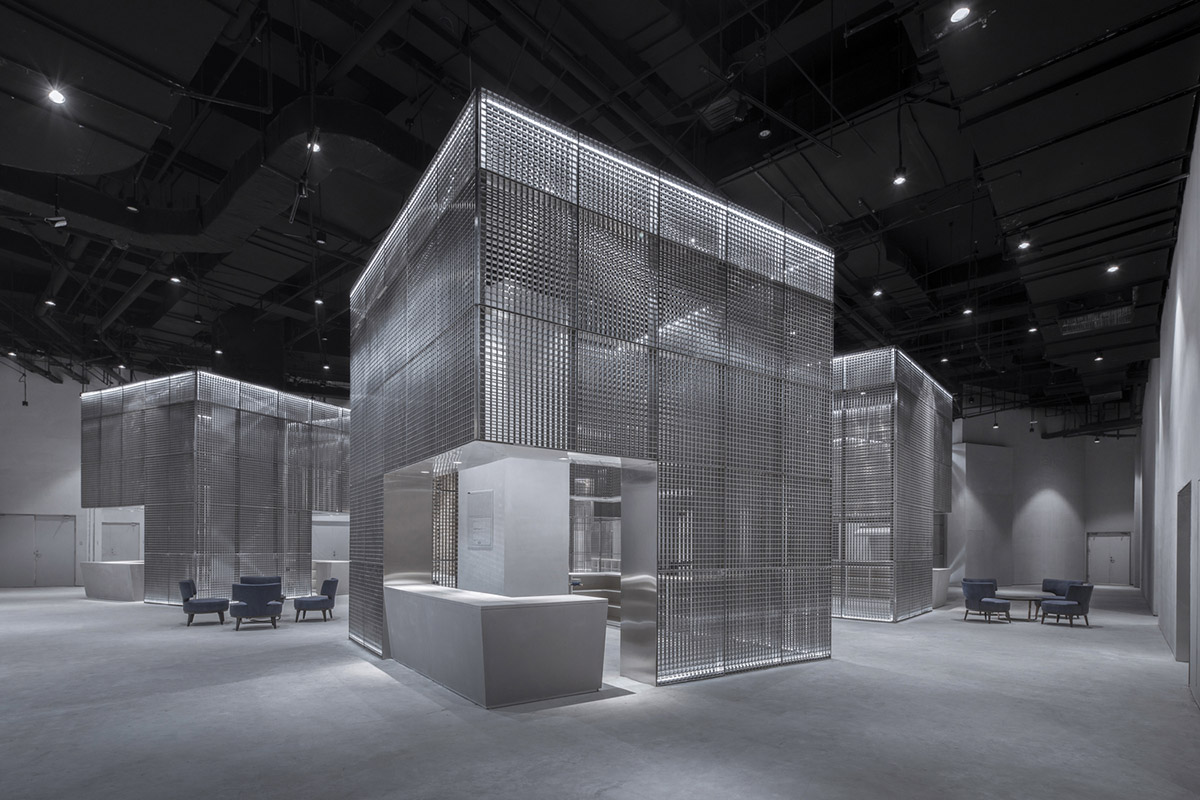 BANDe Architects combines greyscale interior with gridded wooden structures for GreenMonster Lab