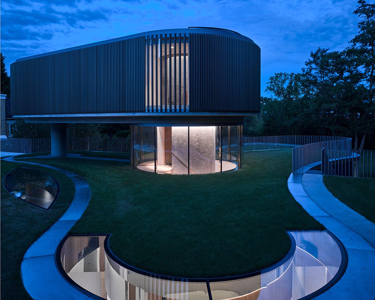 Elegant details and trefoil-shaped garden form this family house by Eldridge London in Coombe Park