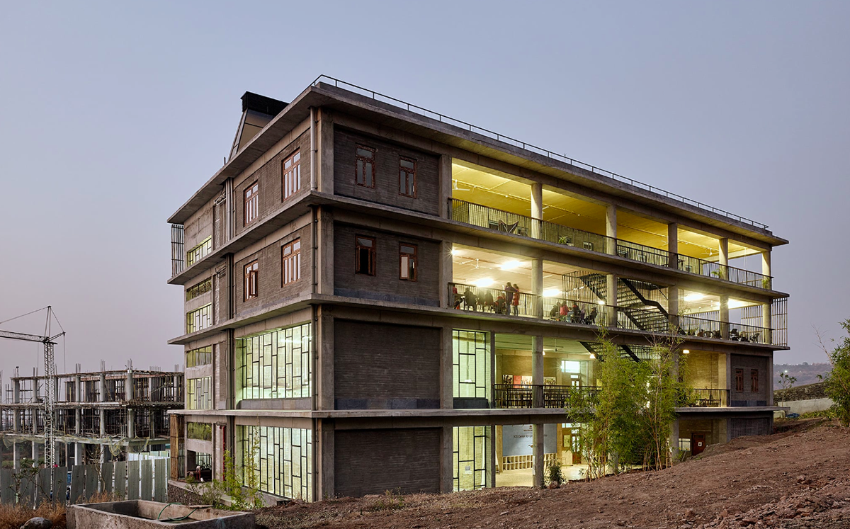 Avasara Academy, resembling an unfinished structure, educates young women in the moorland of Pune