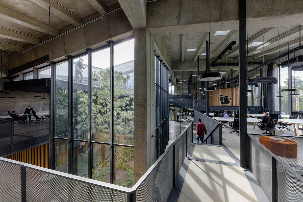 Folded concrete shell wraps coffee production plant by Giorgi Khmaladze Architects in Tbilisi