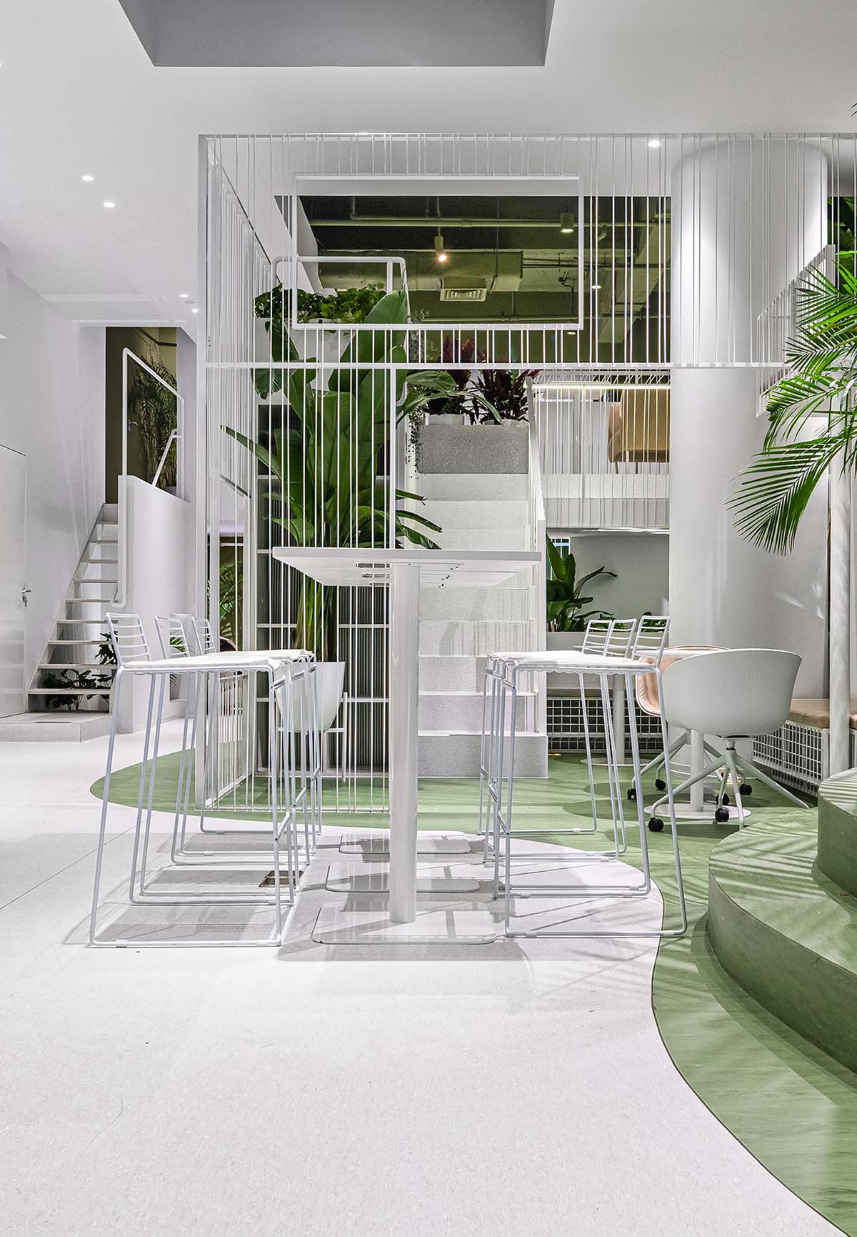 QUCESS Design completes Inno. EcoSLab combining white and green colors to energize interiors
