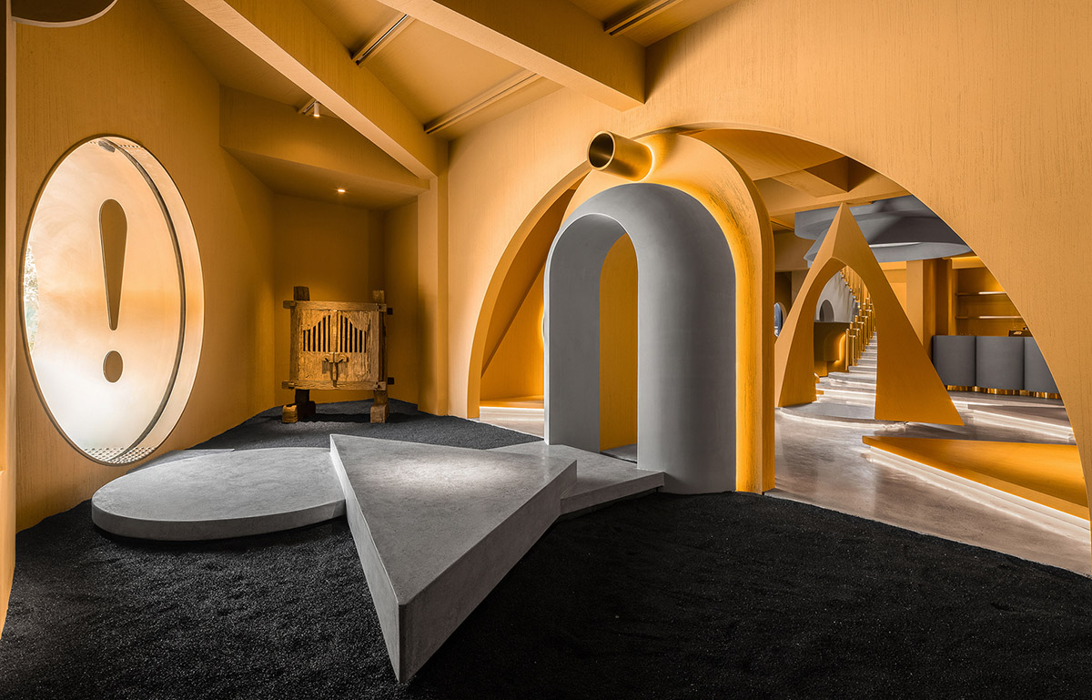 Angular corrugated stainless steel sheets form this showroom designed by PIG DESIGN in Hangzhou