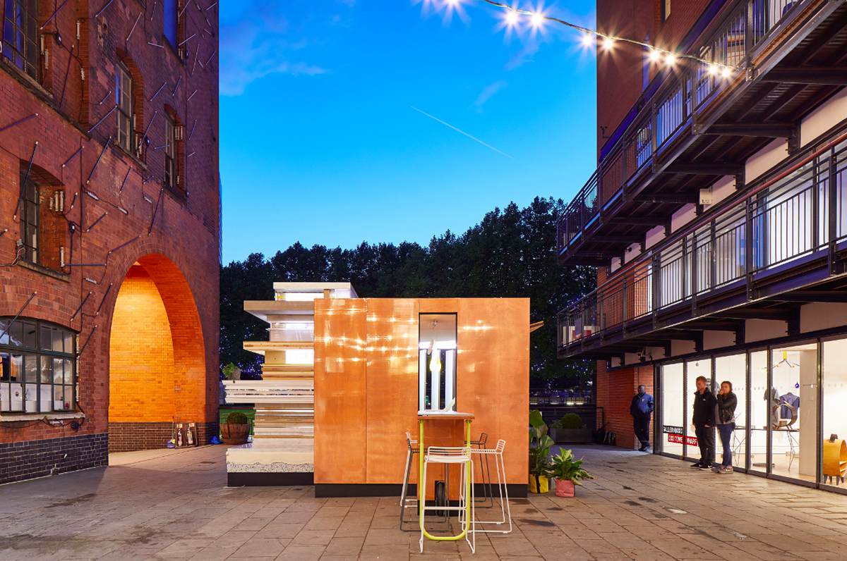 Sam Jacob attaches layered mini library to his micro-home for MINI