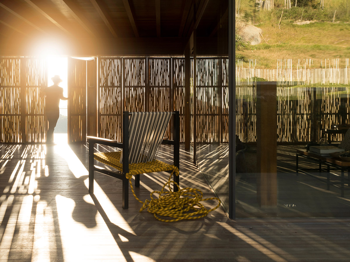 Narrow wooden Catu&ccedil;aba House by Studio MK27 produces its own energy on a valley of S&atilde;o Paulo