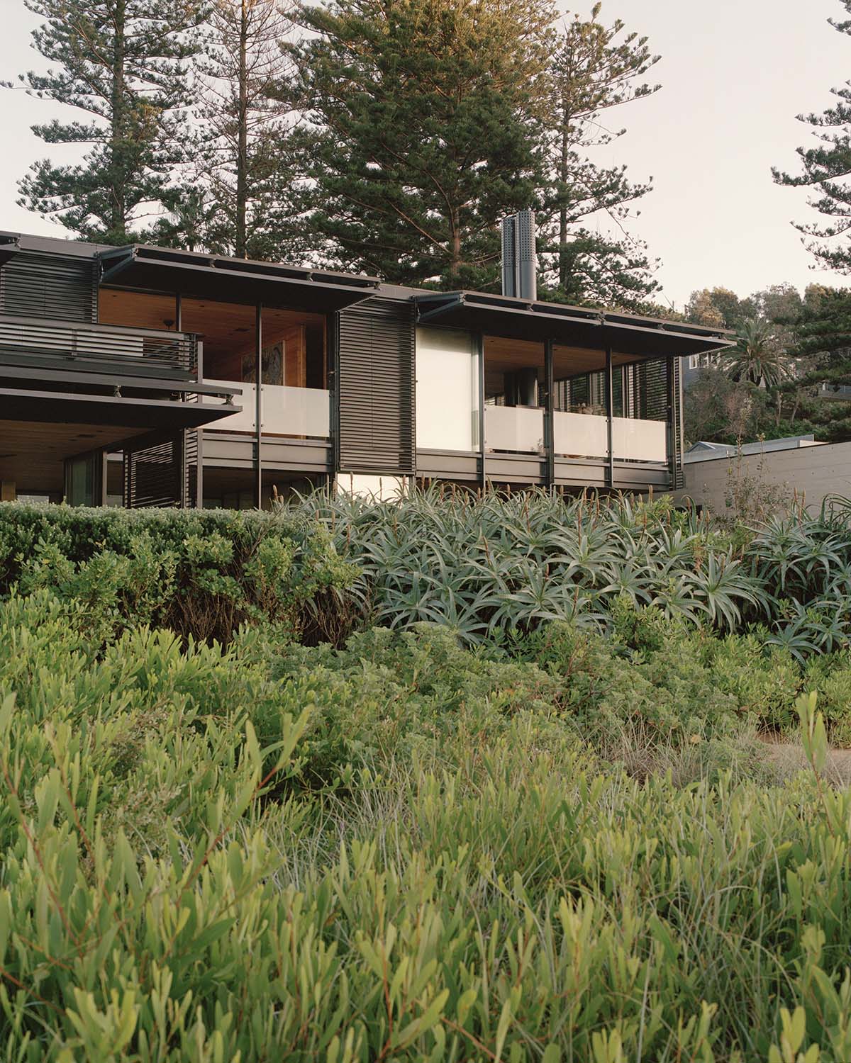 Olson Kundig's Bilgola Beach House features operable louvred shutters in Sydney