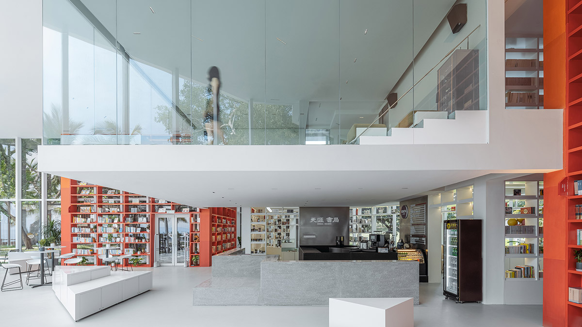 Wutopia Lab elaborates bookstore with red triangular bookshelves for Tianya Books in China 