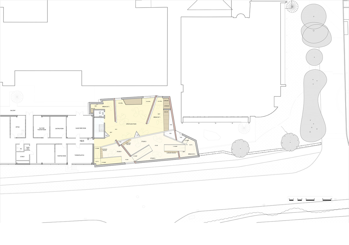 Construction begins on CRAB Studio's orange-colored Innovation Hub at Arts University Bournemouth