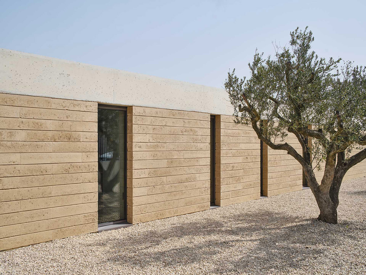 Atheleia Arquitectura completes Casa Artiga with rammed earth walls in Barcelona 