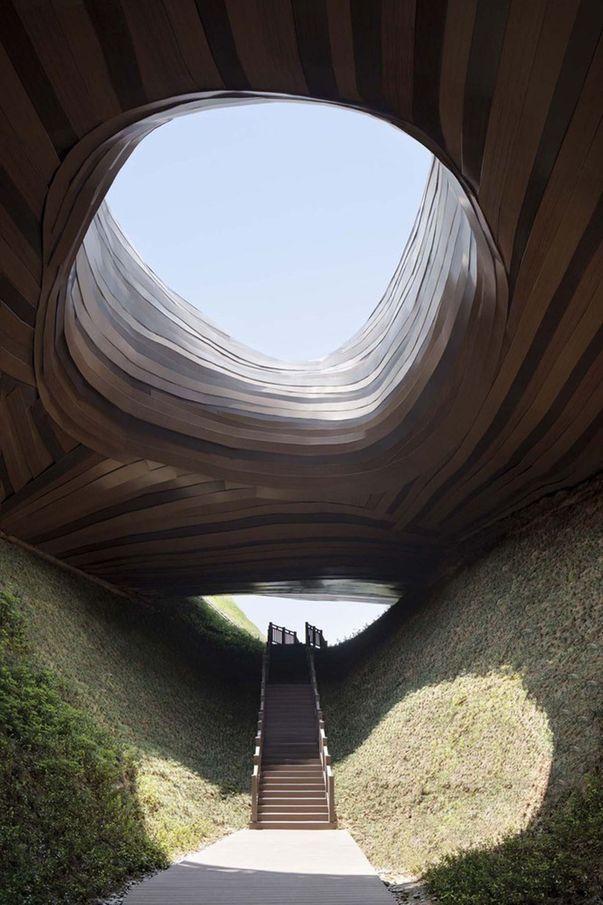 CROX's super smooth Liyang Museum sits on undulating hills as part of the nature in Changzhou