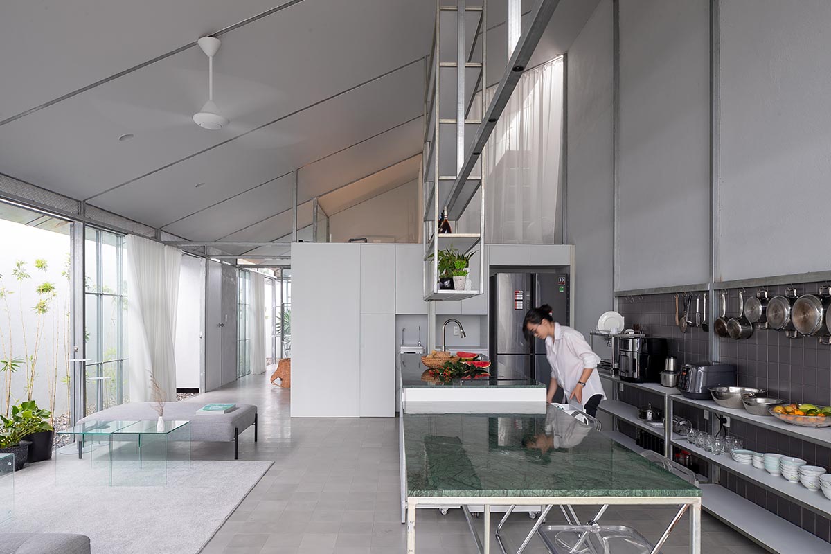 MIA Design Studio completes family house with angular roof in Vietnam 