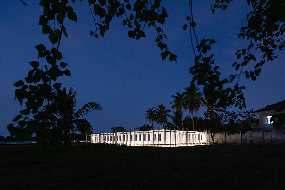 MIA Design Studio's Ashui Pavilion is made of white layers of fabric creating soft curve in Vietnam 