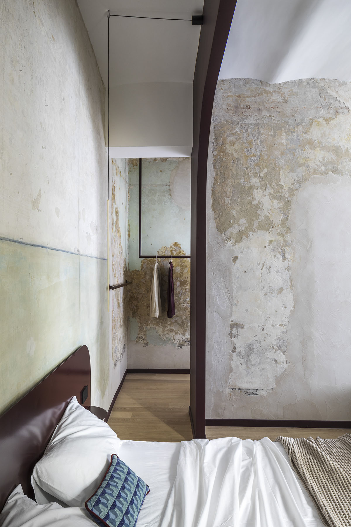 Totem House by STUDIOTAMAT is a rental home presenting cold shades and industrial looking in Rome 