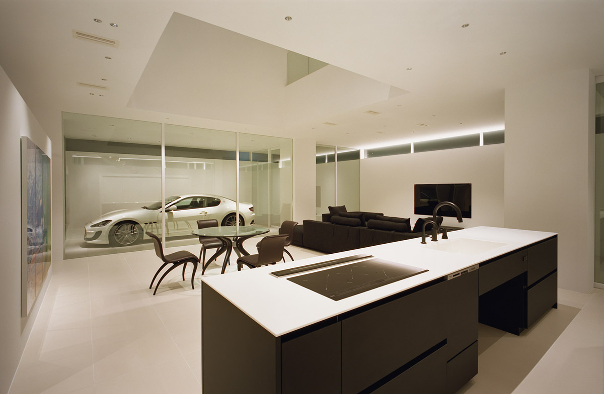 Fujiwaramuro Architects designs family house with thin skylights and transparent built-in garage