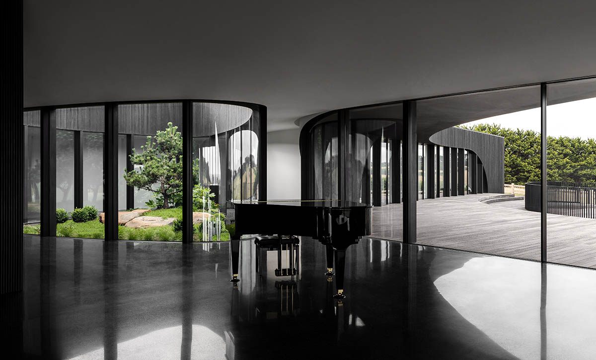 Wood Marsh translates topography lines into snake-like Peninsula House in Australia 