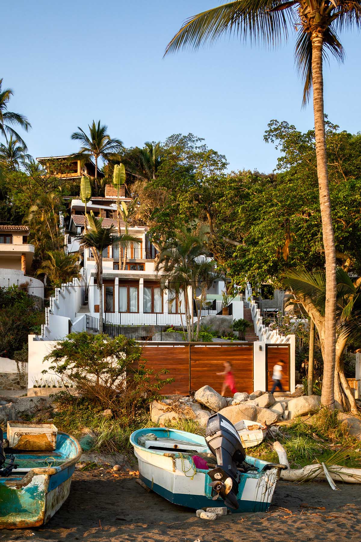 MAIN OFFICE's family house blends into the tropical landscape of a surfers' town in Mexico