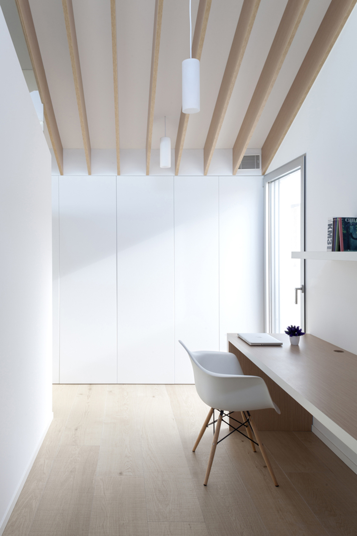 Pablo Muñoz Payá Arquitectos renovates former house with wooden shutters in Spain