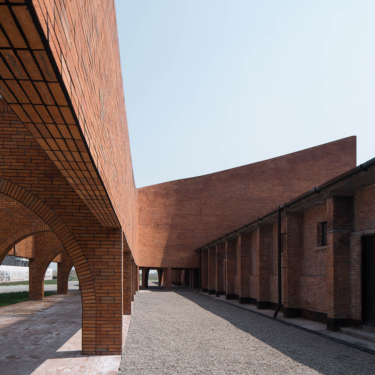 Roarc Renew repurposes old granaries as an art centre with flowing brick corridors in Jiaxing, China