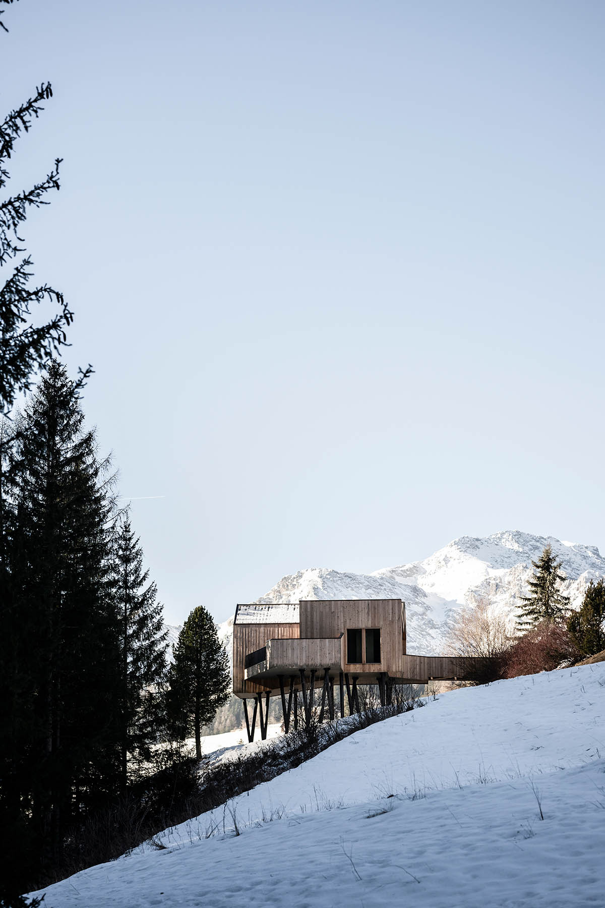 Zigzag roof defines character of Olympic Spa Hotel by NOA in the Alpine meadow