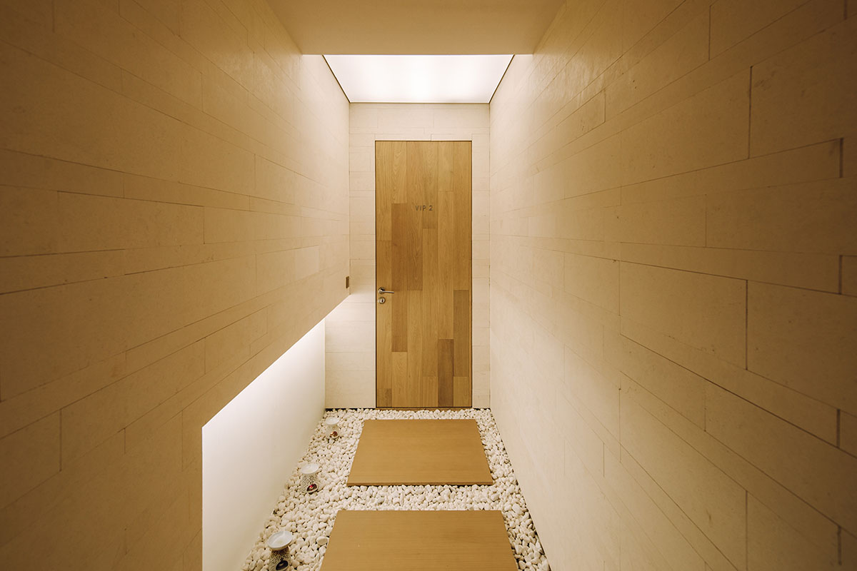 Studio DOTCOF creates cave-like interior spaces for a beauty salon in Shanghai