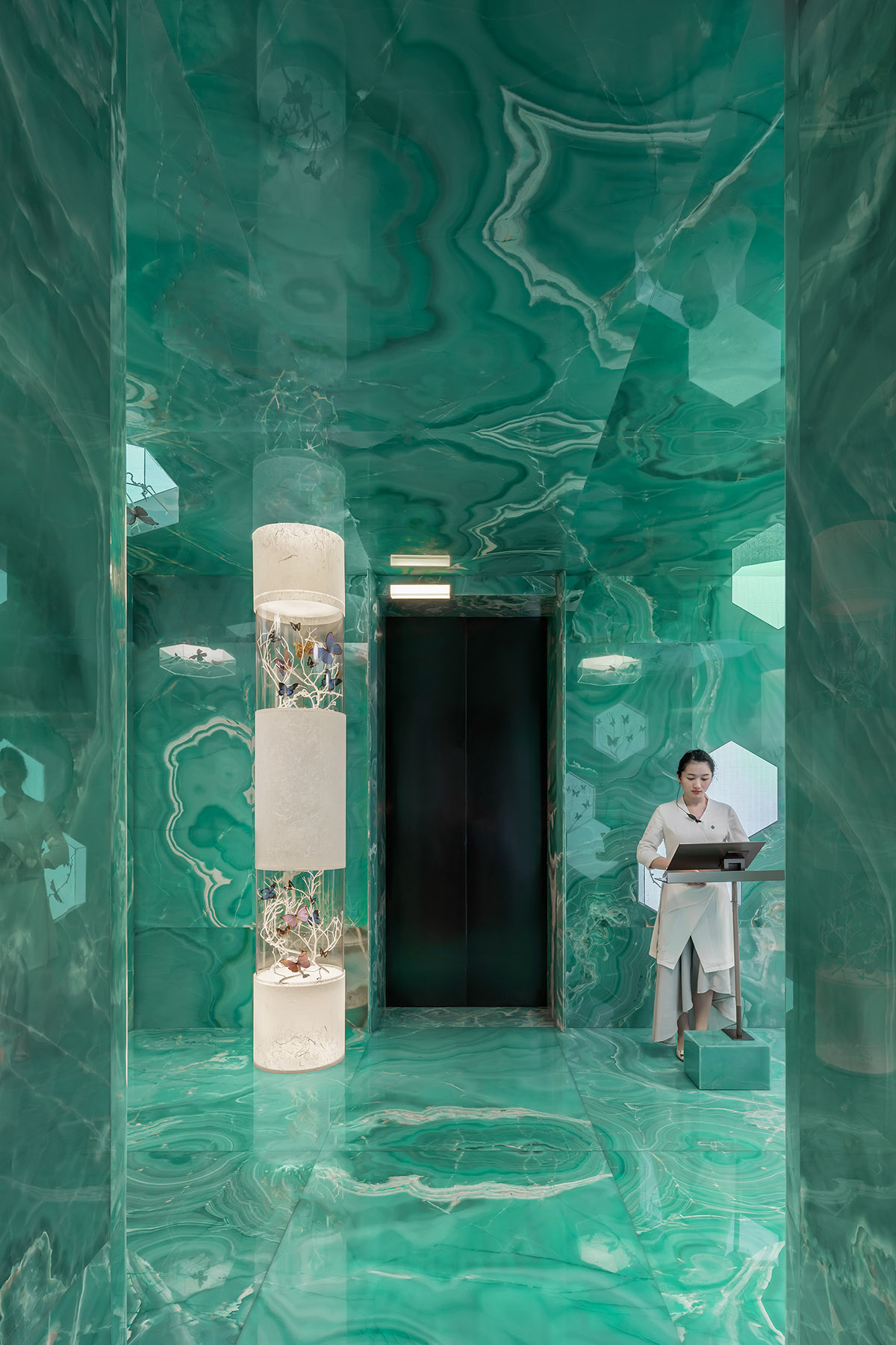 Nature Times Art Design completes restaurant with cave-like wall and garden-themed hall in Hangzhou