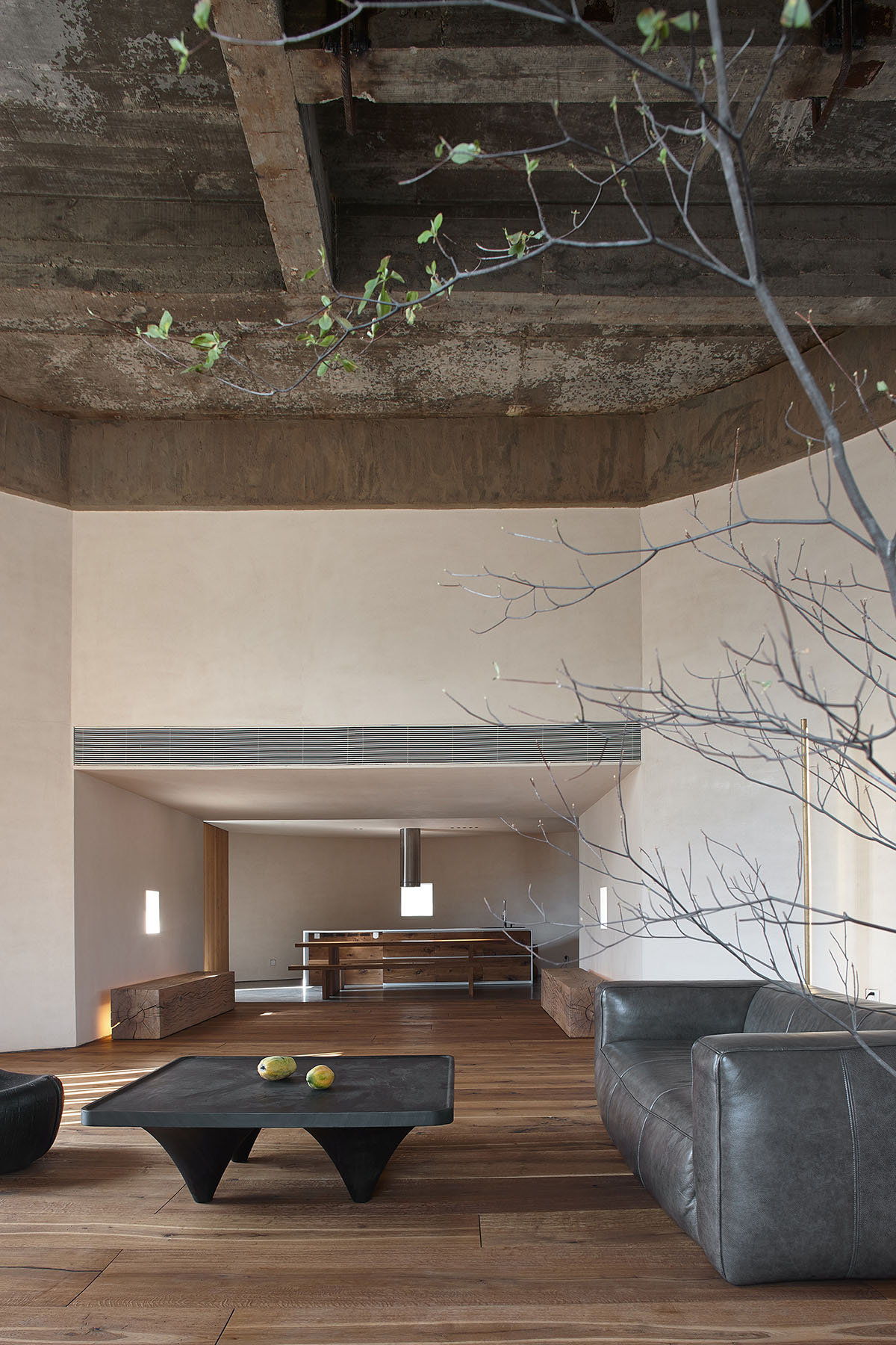 ZMY Design creates earth-toned interiors for a woodwork enthusiast’s house in Fujian, China