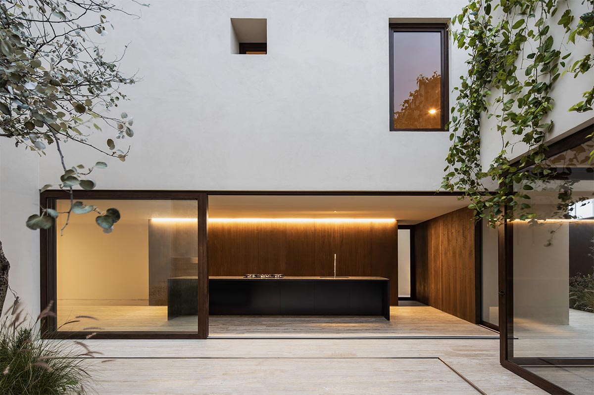 Sabino 10 residence by Editorial features a solid façade with hermetic volumes in Mexico