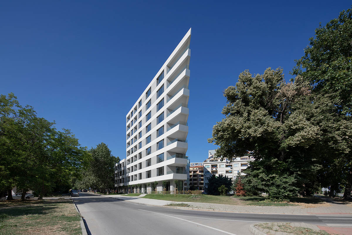 Sharp triangular balconies define this residential block designed by STARH in Bulgaria
