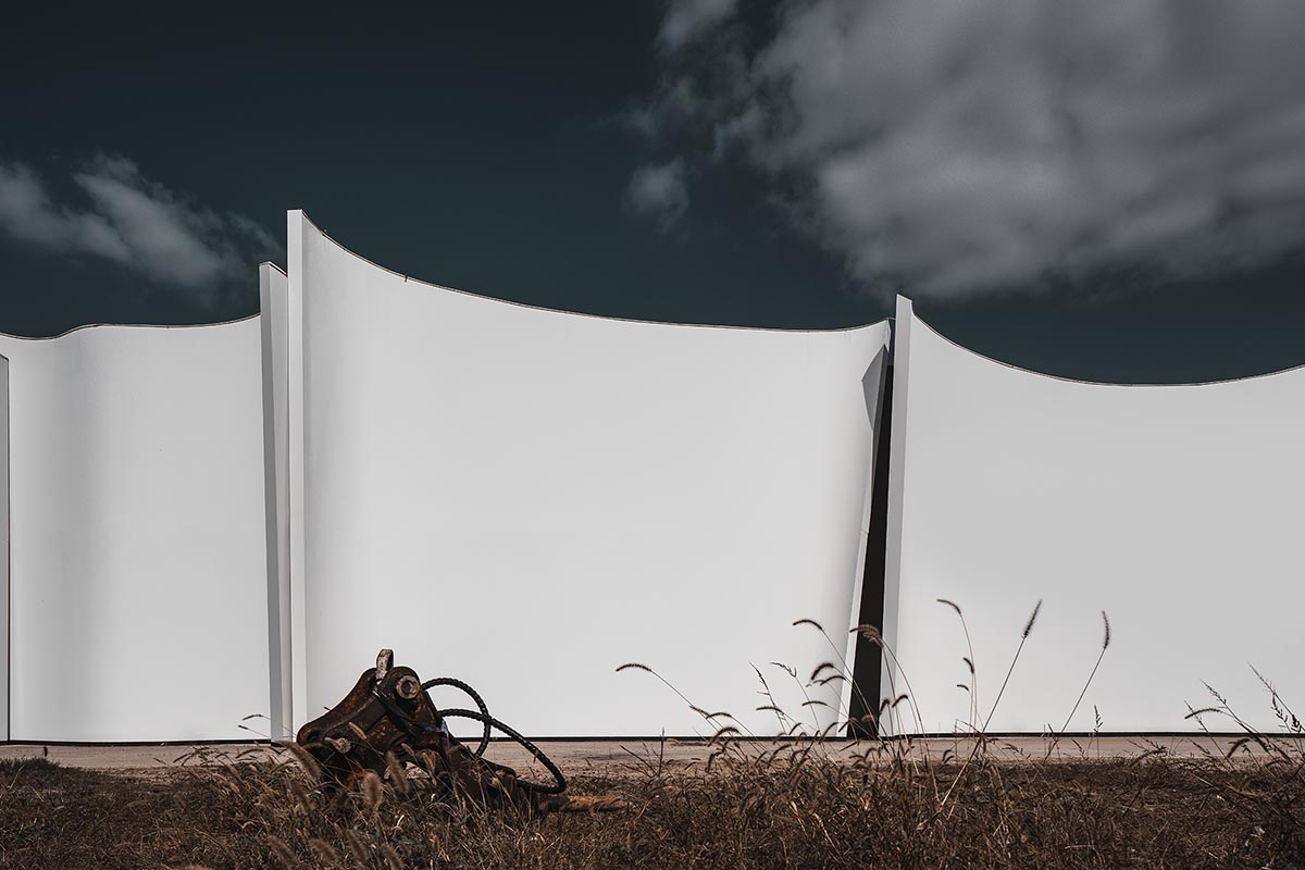 Chinese chapel creates a fluid silhouette featuring curving walls to mimic blossoming petals 