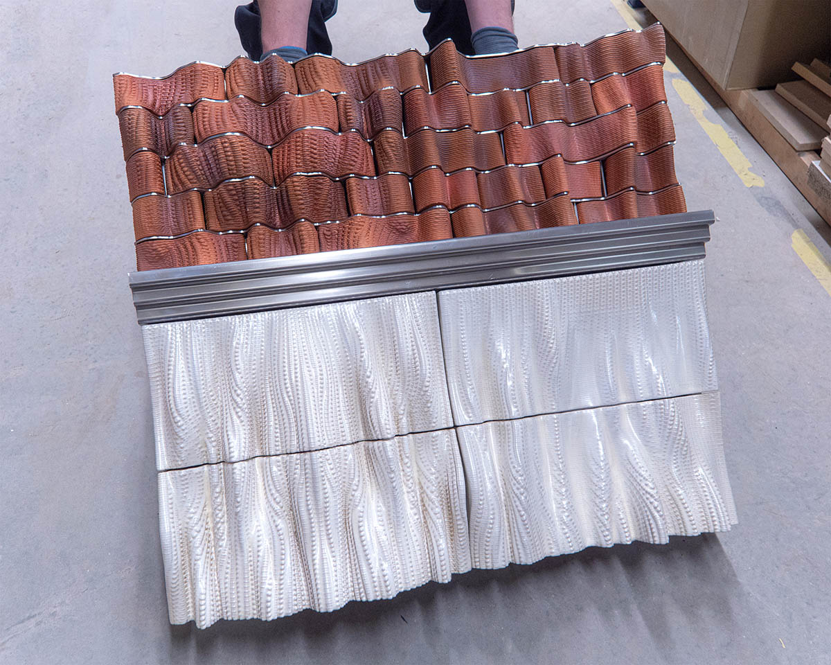 Studio RAP creates façade featuring bespoke 3D-printed ceramic tiles and bricks