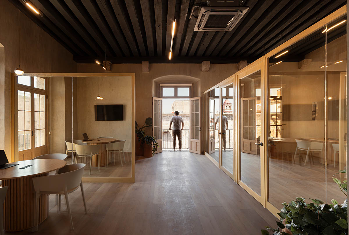 FMA. designs corporate building with warm, earthy tones in a former 17th-century convent