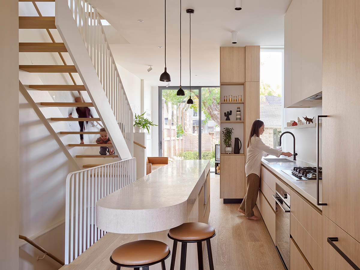 Reign Architects reimagines a historic 1850s Victorian home with open and warm interiors
