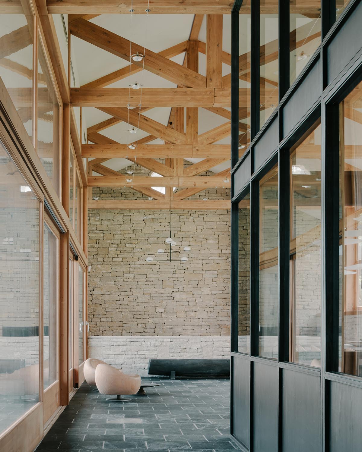 The stone and wood Tbilisi residence integrates architecture with the natural landscape