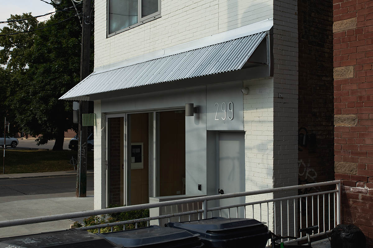 Misc Coffee makes a bold statement with green translucent bar in a busy street of Toronto