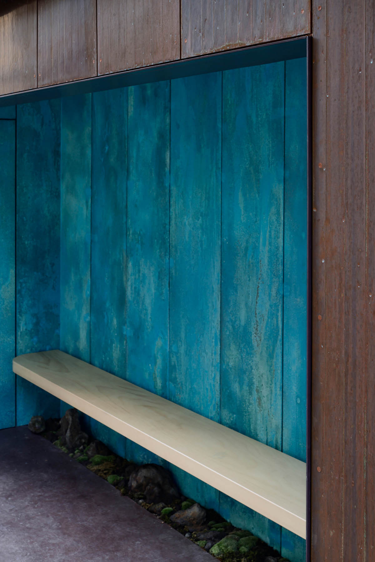 The one-meter-deep cafe invites customers with its patina color on its facade in Kyoto