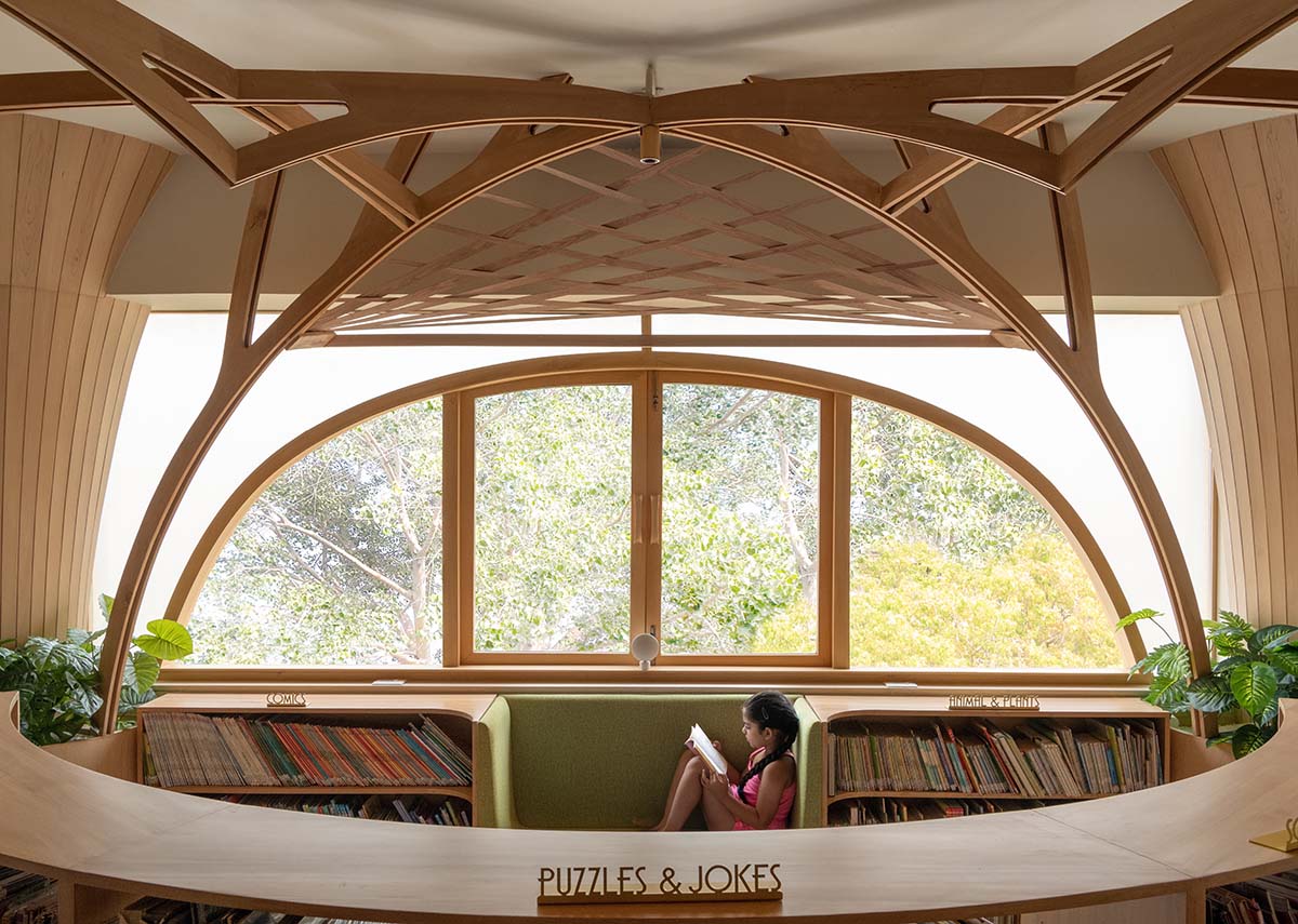 studio Hinge embeds a library under the wooden tree-like canopies in Mumbai
