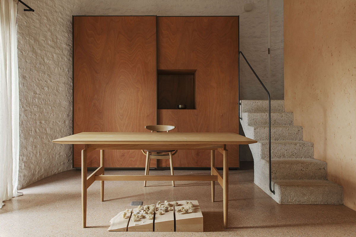 Pastoral round stone dwellings inform Meganisi House by Hiboux Architecture on Meganisi island