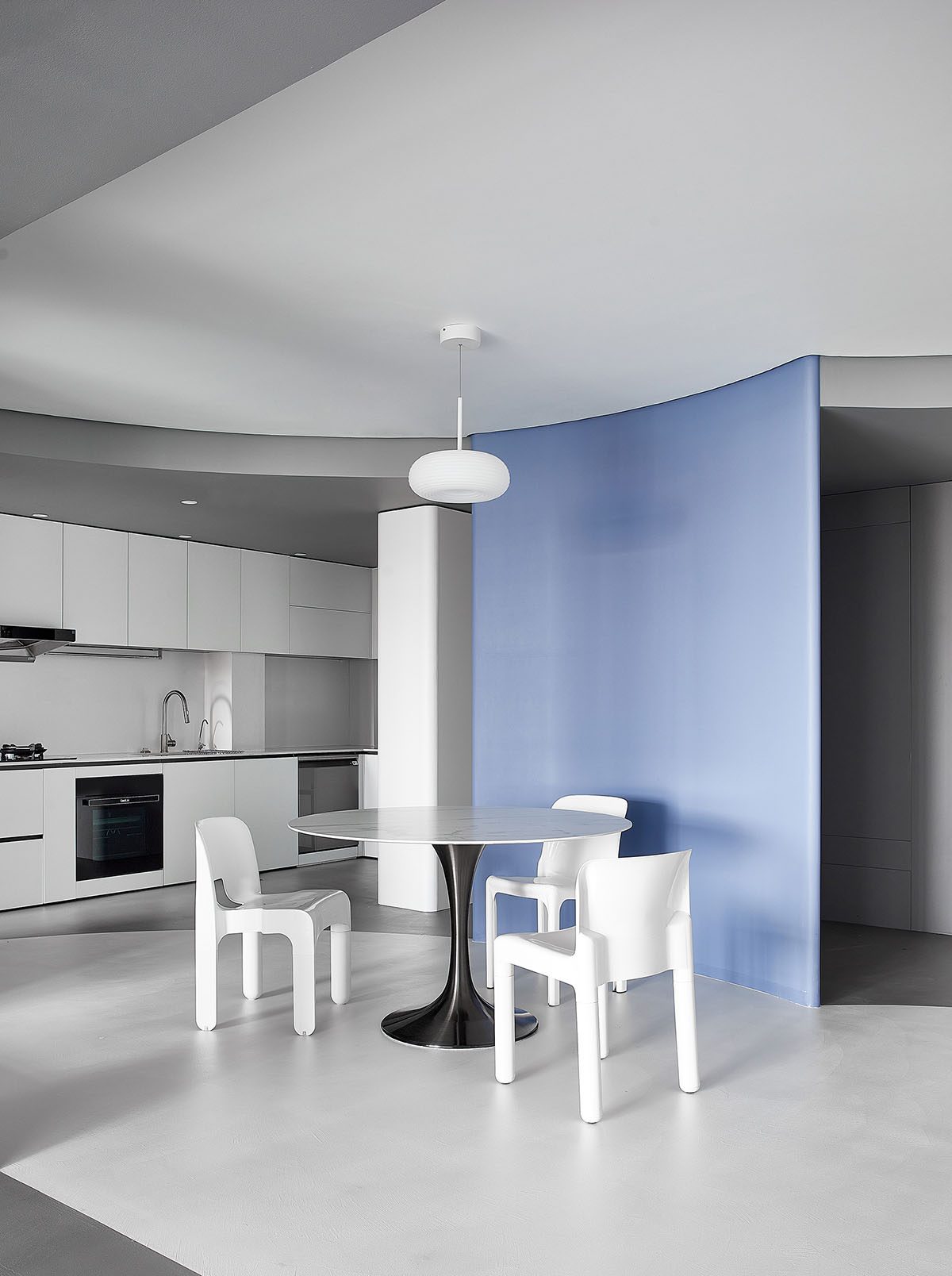 XIGO STUDIO creates gray and blue-colored interiors for apartment in Beijing 