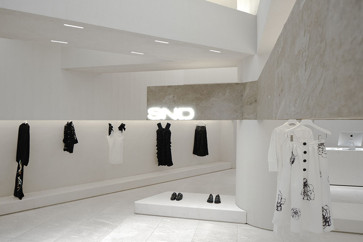 Boutique fashion store by Various Associates is inspired by remaining ancient temples in deserts