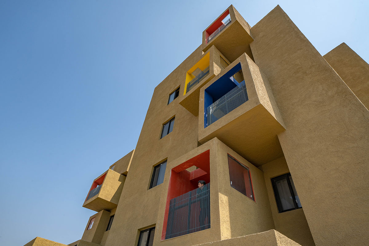 Sanjay Puri Architects designs residential building with colorful cuboid terraces in India