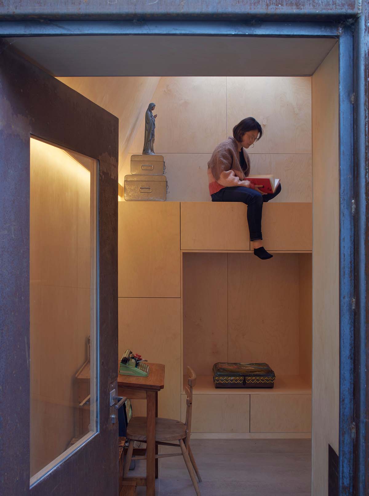 RISE Design Studio built sunken garden studio with rusted steel to provide a hidden place to escape