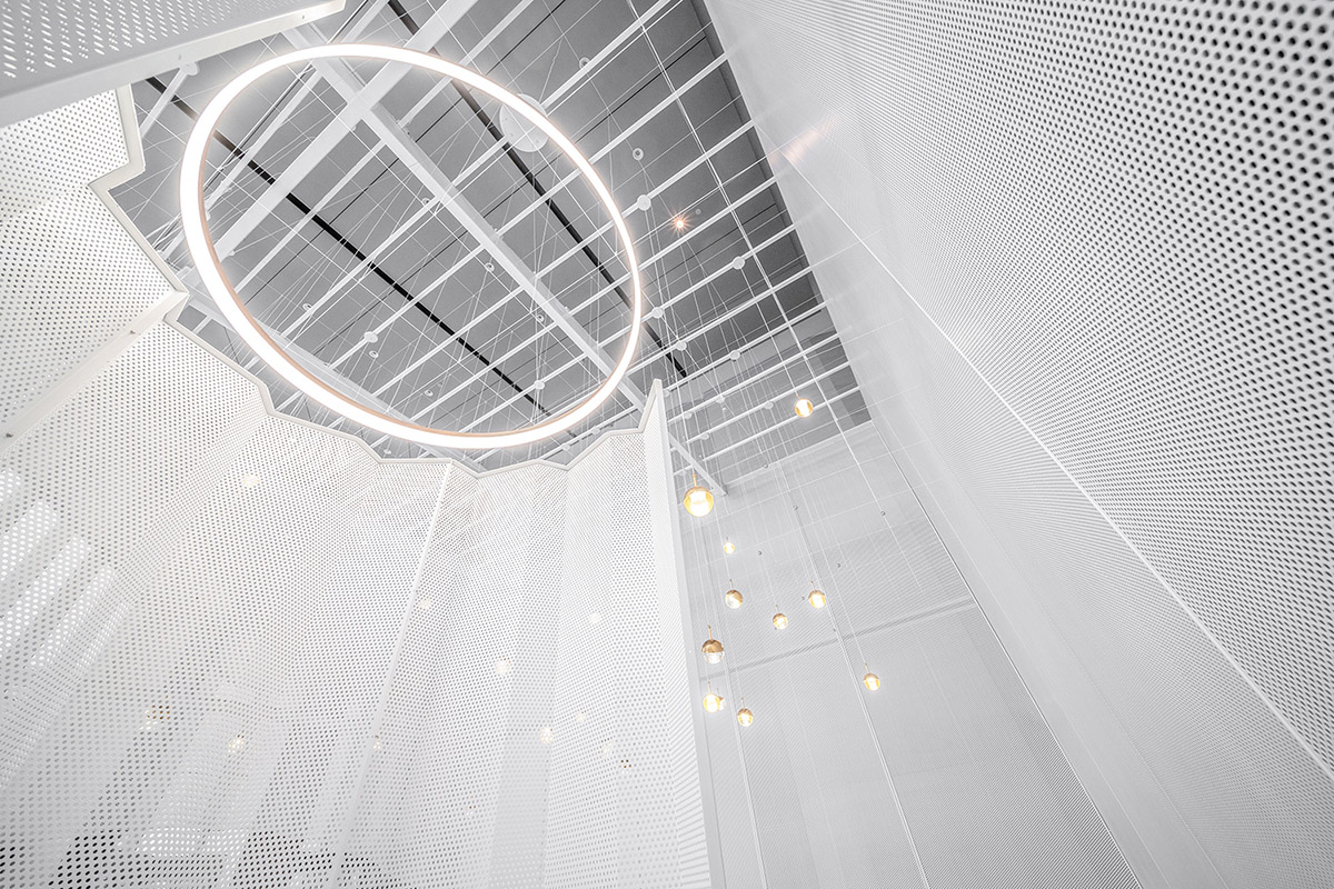 Mur Mur Lab uses all-white folded panels to create nature terrain for a coffee store in Shanghai