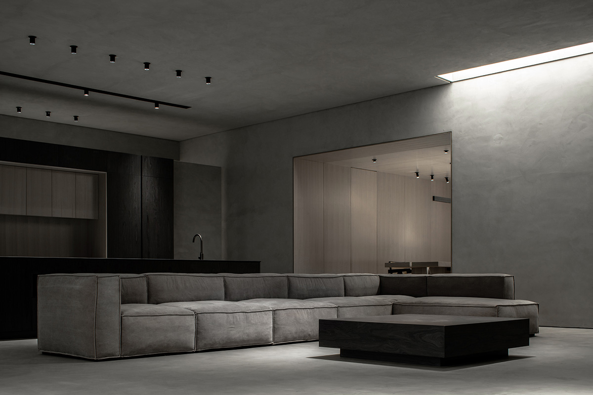 JST ARCHITECTURE creates dark-colored palette by adding a geometrical aesthetic to this showroom