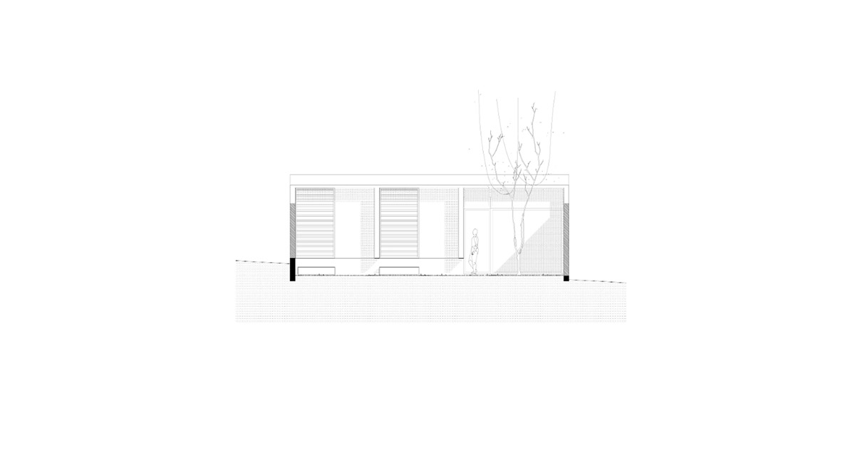 V&atilde;o designed recessed volumes and leaning red wall to offer flexible spaces for this Brazilian house