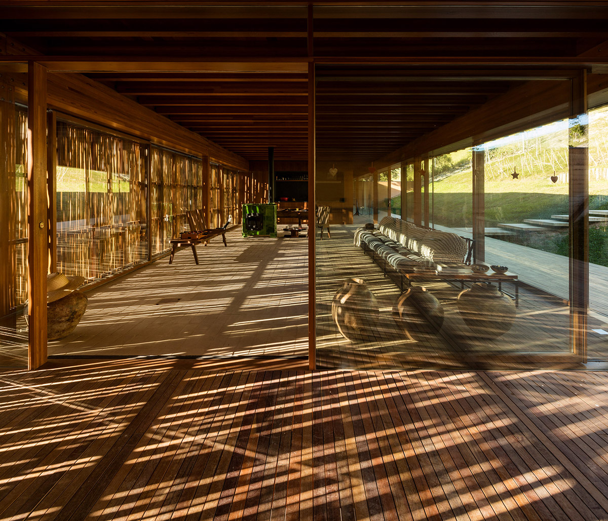 Narrow wooden Catu&ccedil;aba House by Studio MK27 produces its own energy on a valley of S&atilde;o Paulo