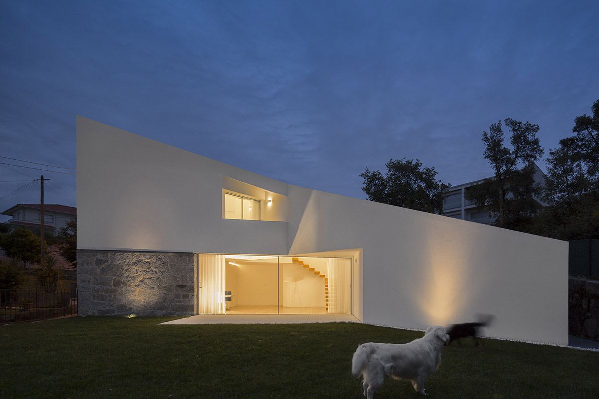 Rui Vieira Oliveira Built Multifaceted House placed atop Ancient Grape Mill In Portugal's village